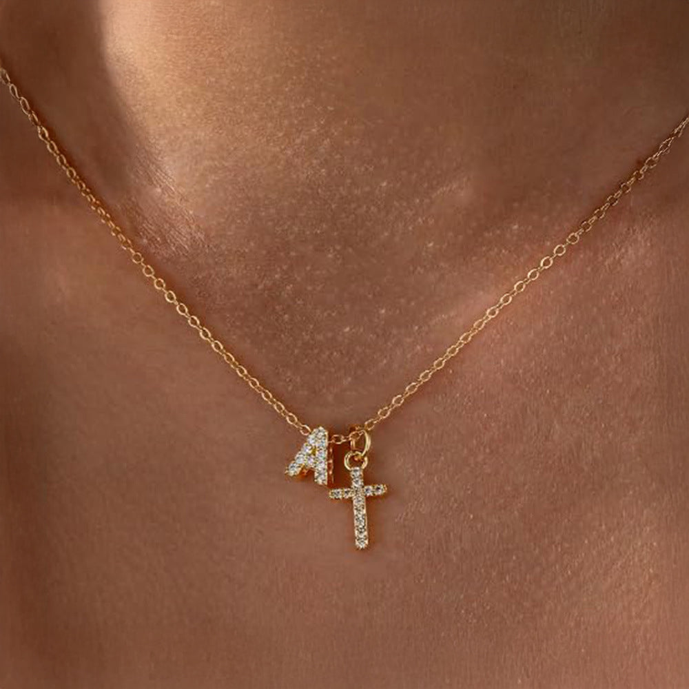 Brehn | Zarte Diamant Initial & Kreuz Halskette