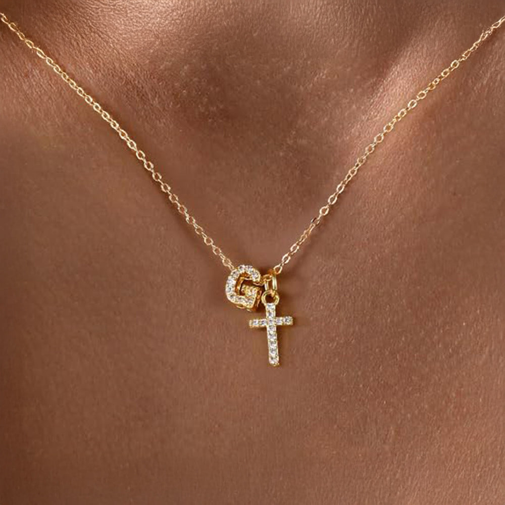 Brehn | Zarte Diamant Initial & Kreuz Halskette
