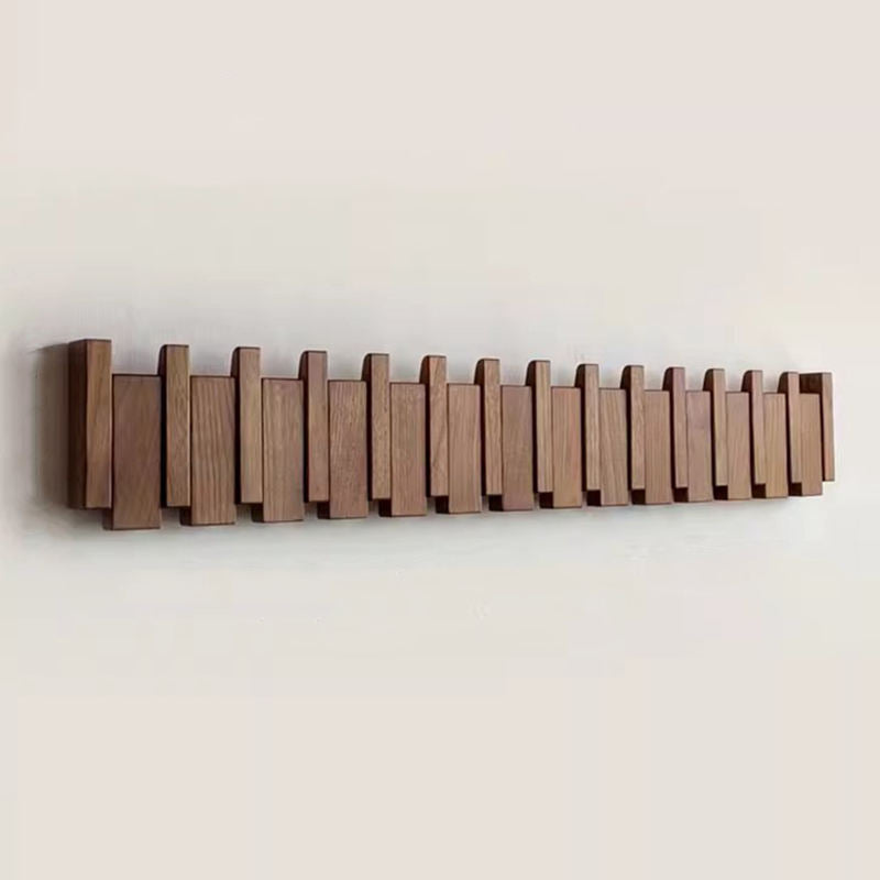 Holzgarderobe im Piano-Design mit klappbaren Haken | Brehn