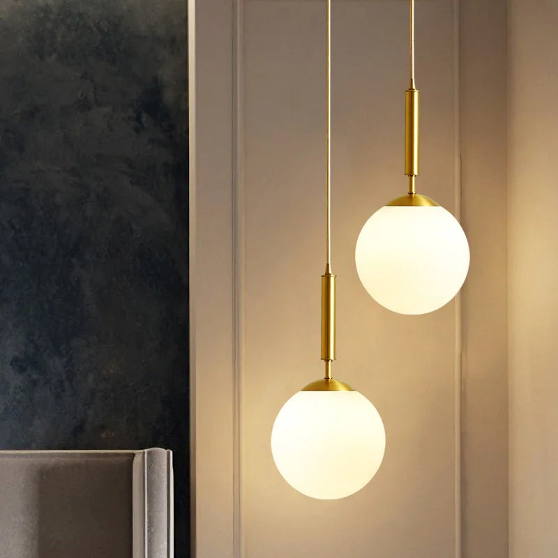 Luxuriöse Hängelampe aus Gold – Moderne Pendelleuchte für Treppenhaus oder Wohnbereich | Brehn