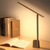 Intelligente LED-Schreibtischlampe mit faltbarem und dimmbarem Design