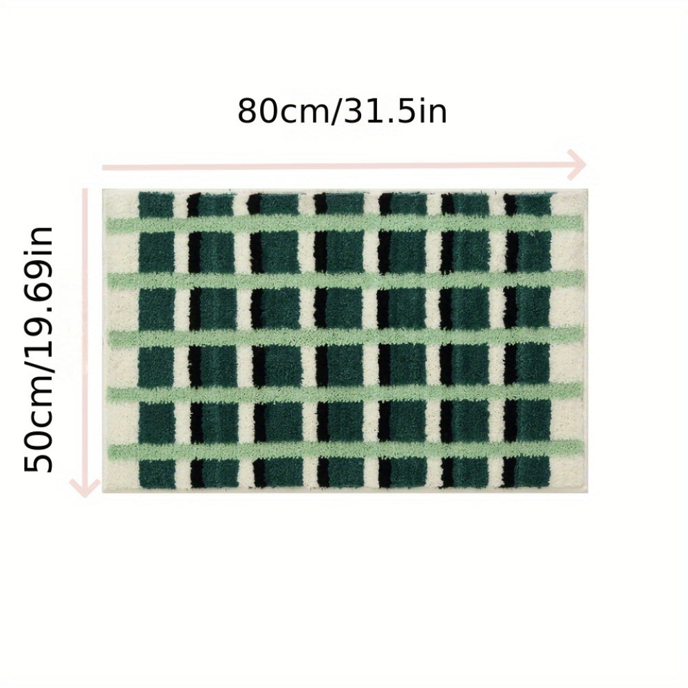Moosgrüne Badematte mit geometrischem Flockmuster