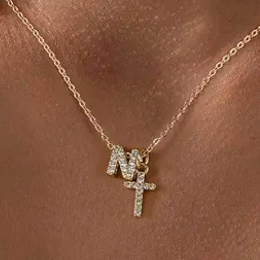 Brehn | Zarte Diamant Initial & Kreuz Halskette
