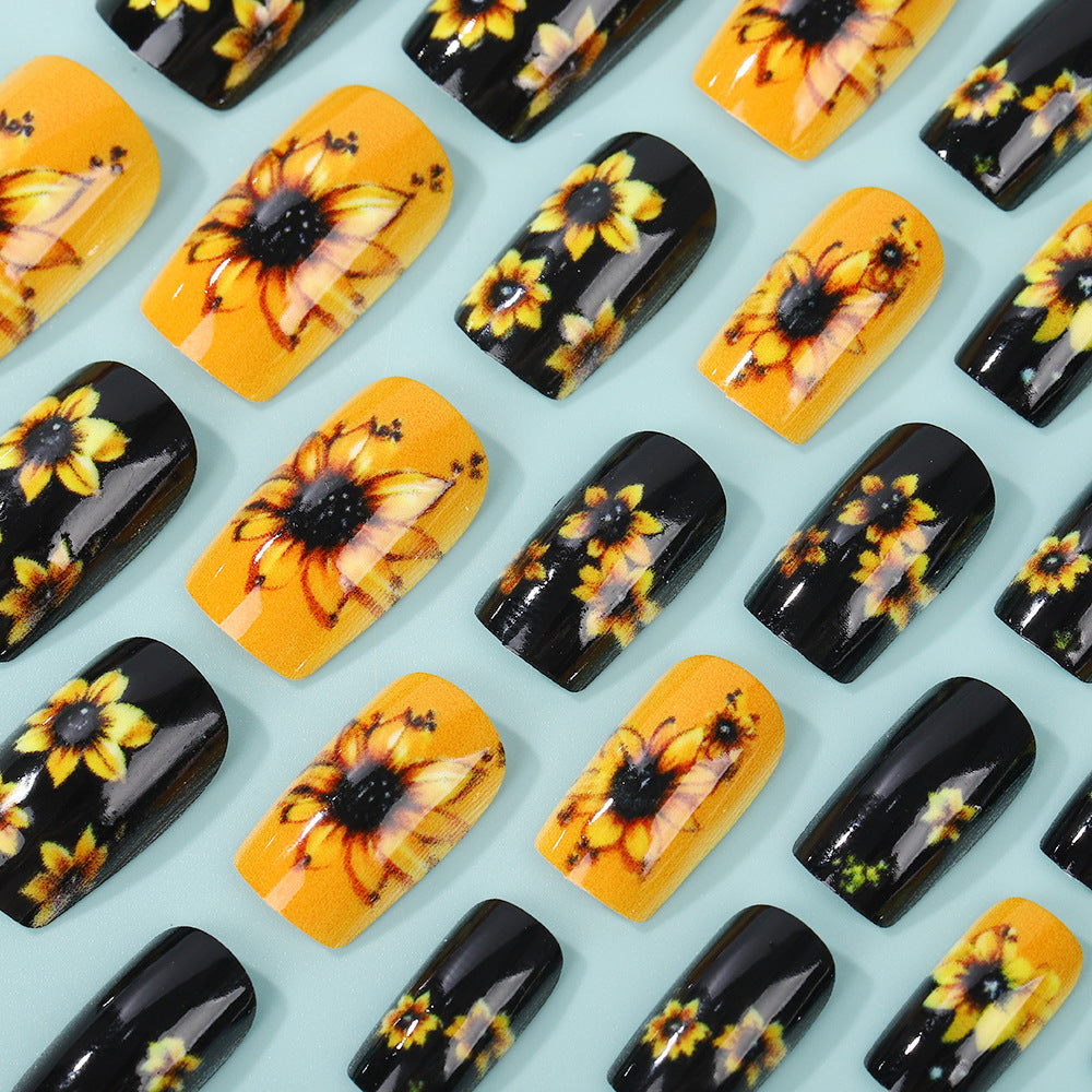 Kunstnägel im floralen Design mit Sonnenblumenmotiv Brehn