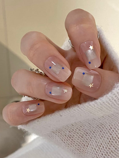 Elegantes Press-On-Nageldesign-Set mit Stern- und Punktmustern Brehn