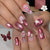 Dekorative Press-On Nagelkunst mit floralen Akzenten Brehn