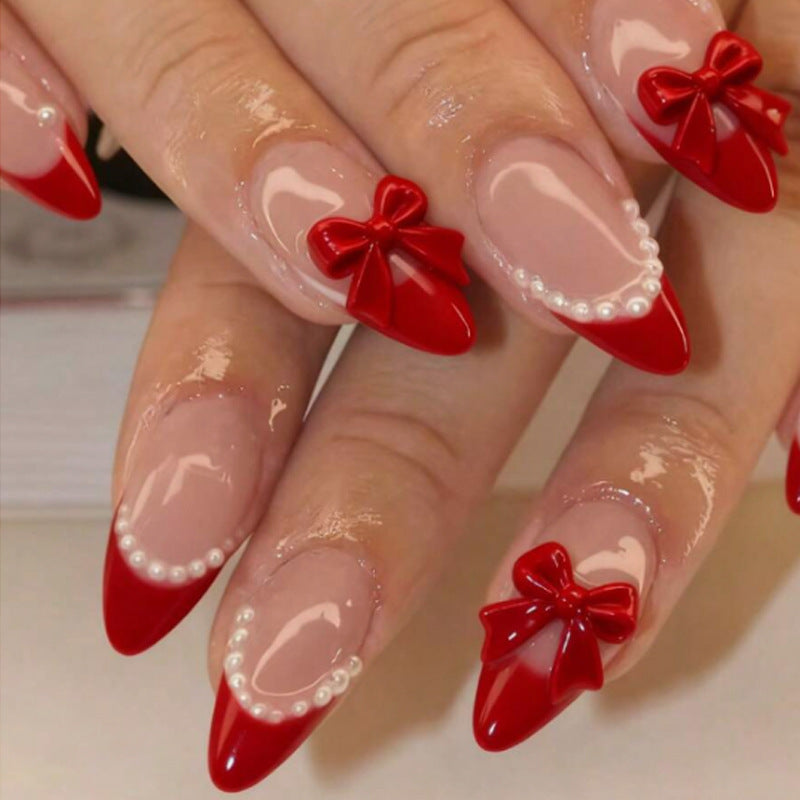 Kunstnagelset mit hochwertigem Schleifen- und Perlendesign Brehn