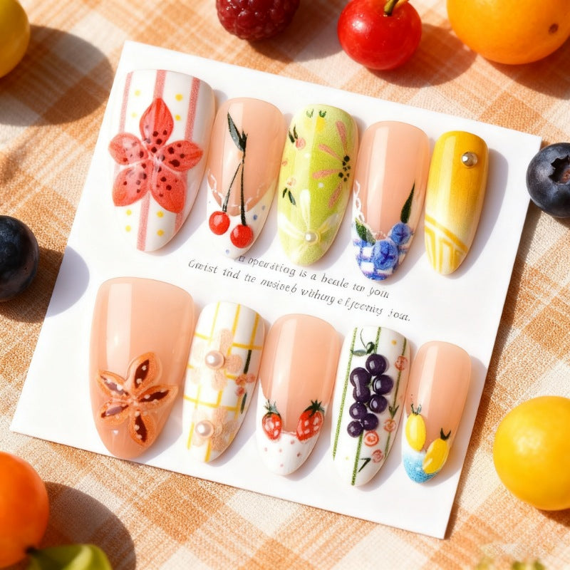 Dekoratives Press-On Nail Art Set mit floralen und obstigen Designs Brehn