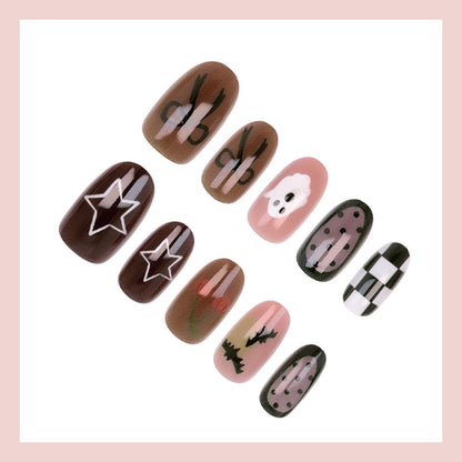 Kunstnagelset mit kreativen Halloween-Motiven und glitzernden Akzenten Brehn