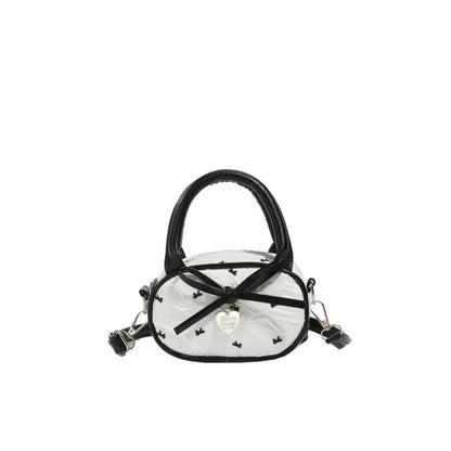 Gepolsterte Mini-Handtasche mit Herzdetail Brehn