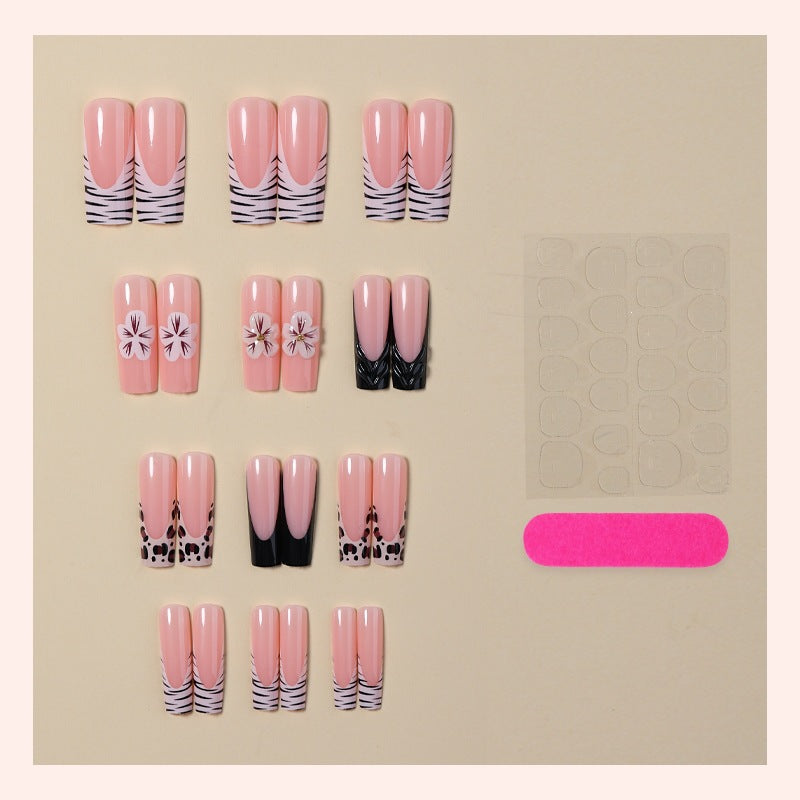 Kunstnagelset mit floralen und marmorierten Designs Brehn