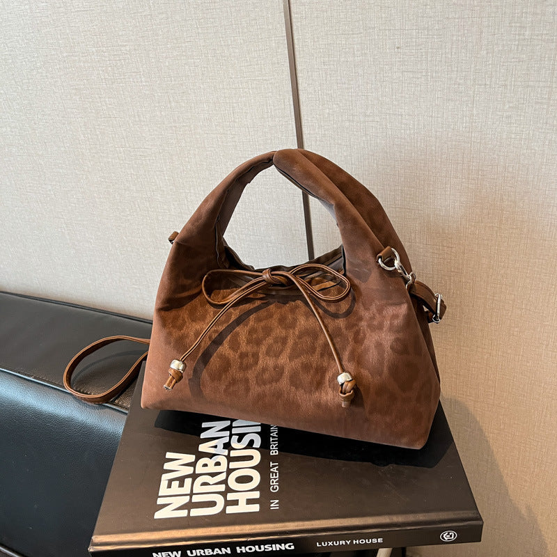 Stylische und funktionale Drawstring-Handtasche Brehn