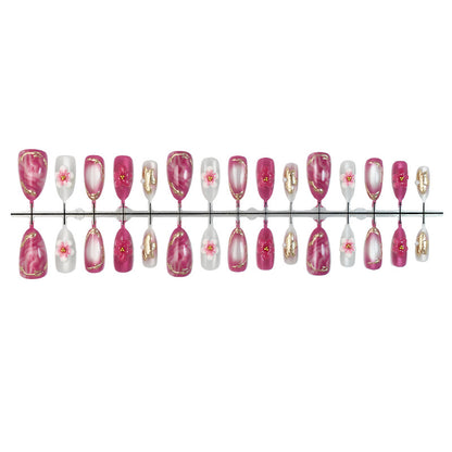 Kunstnagelset mit floralen Akzenten und Glitzerdetails Brehn