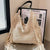 Damen Makramee Handtasche mit fransigen Details Brehn