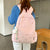 Verspielter Rucksack mit Einzigartigen Backmuster-Applikationen Brehn