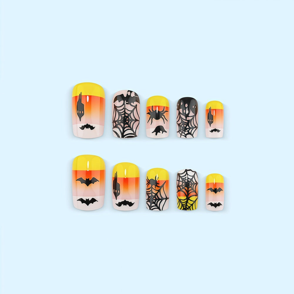 Kunstnägel im kreativen Halloween-Stil mit Spinnen- und Fledermausmotiven Brehn