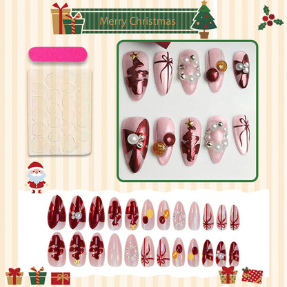 Kunstnagelset mit festlichen Weihnachtsmotiven und glamourösen Dekorationen Brehn