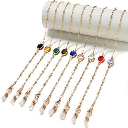Eleganter mit Edelsteinen verzierter Brillenhalter Brehn