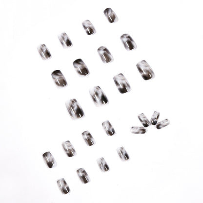 Kunstvolle Nagelverlängerungen mit elegantem Marmor-Design Brehn