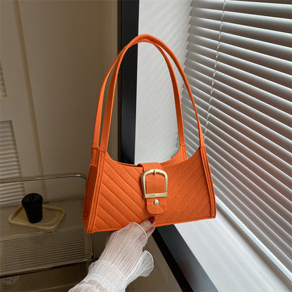 Strukturierte gesteppte Handtasche