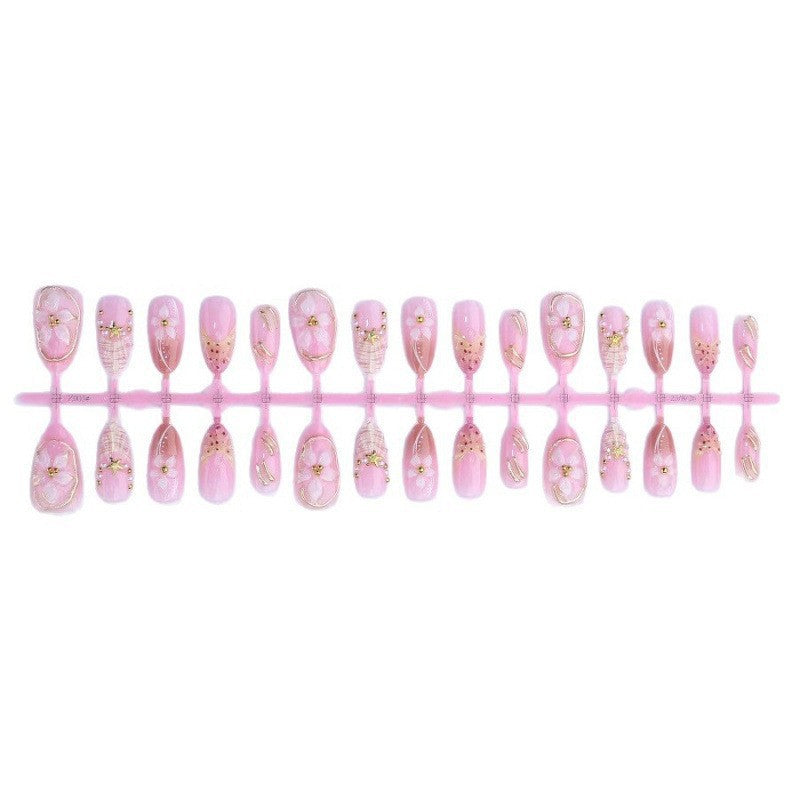 Kunstnagelset mit luxuriösen 3D-Blüten und edlen Akzenten Brehn