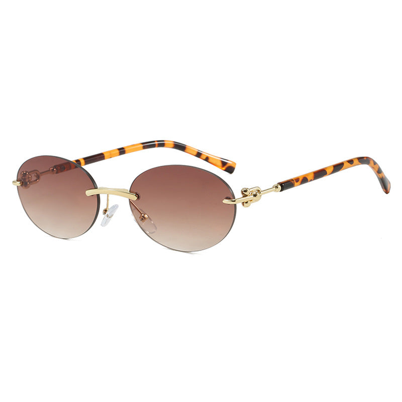 Damen ovale Sonnenbrille mit luxuriösem Metallrahmen und verspiegelten Gläsern Brehn