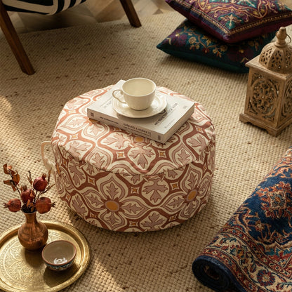 Rundes Sitzpouf mit gewebter Jacquard-Struktur und praktischem Tragegriff Brehn