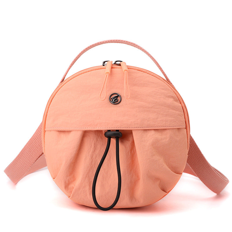 Runde Crossbody-Tasche Brehn