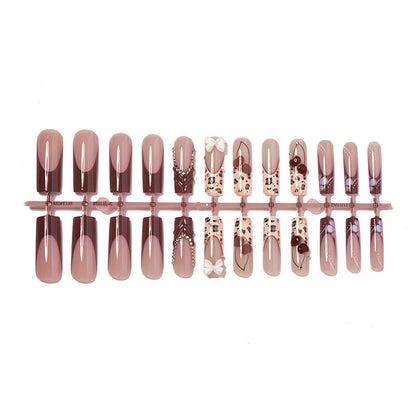 Kunstnagelset mit floralem und glamourösem Design Brehn