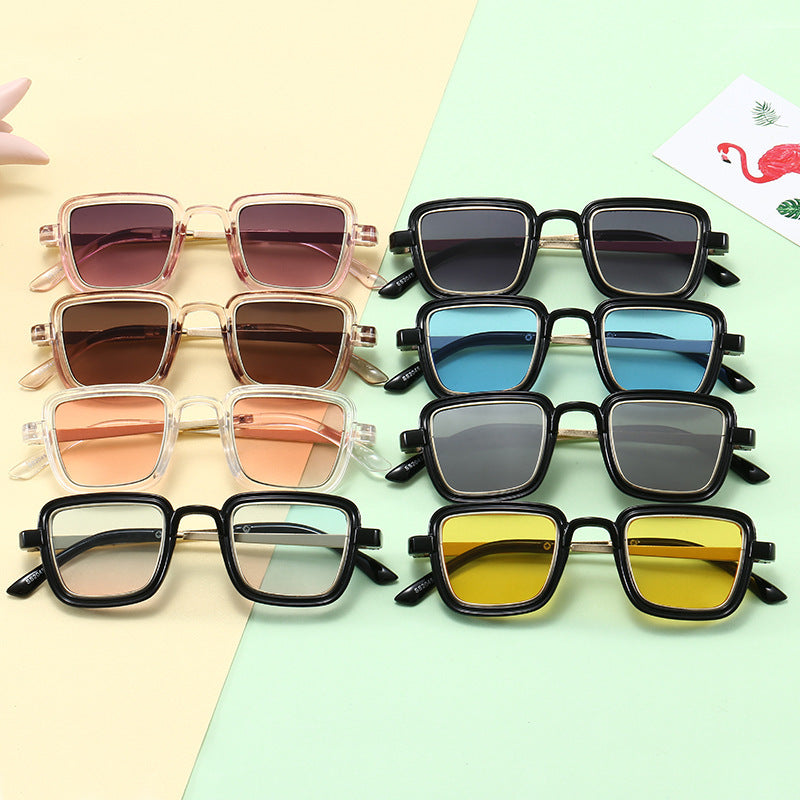 Damen quadratische Sonnenbrille mit transparentem Rahmen und goldenen Akzenten Brehn