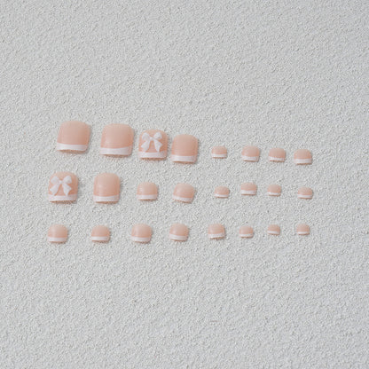 Kunstnagelset mit romantischen Schleifenmotiven Brehn