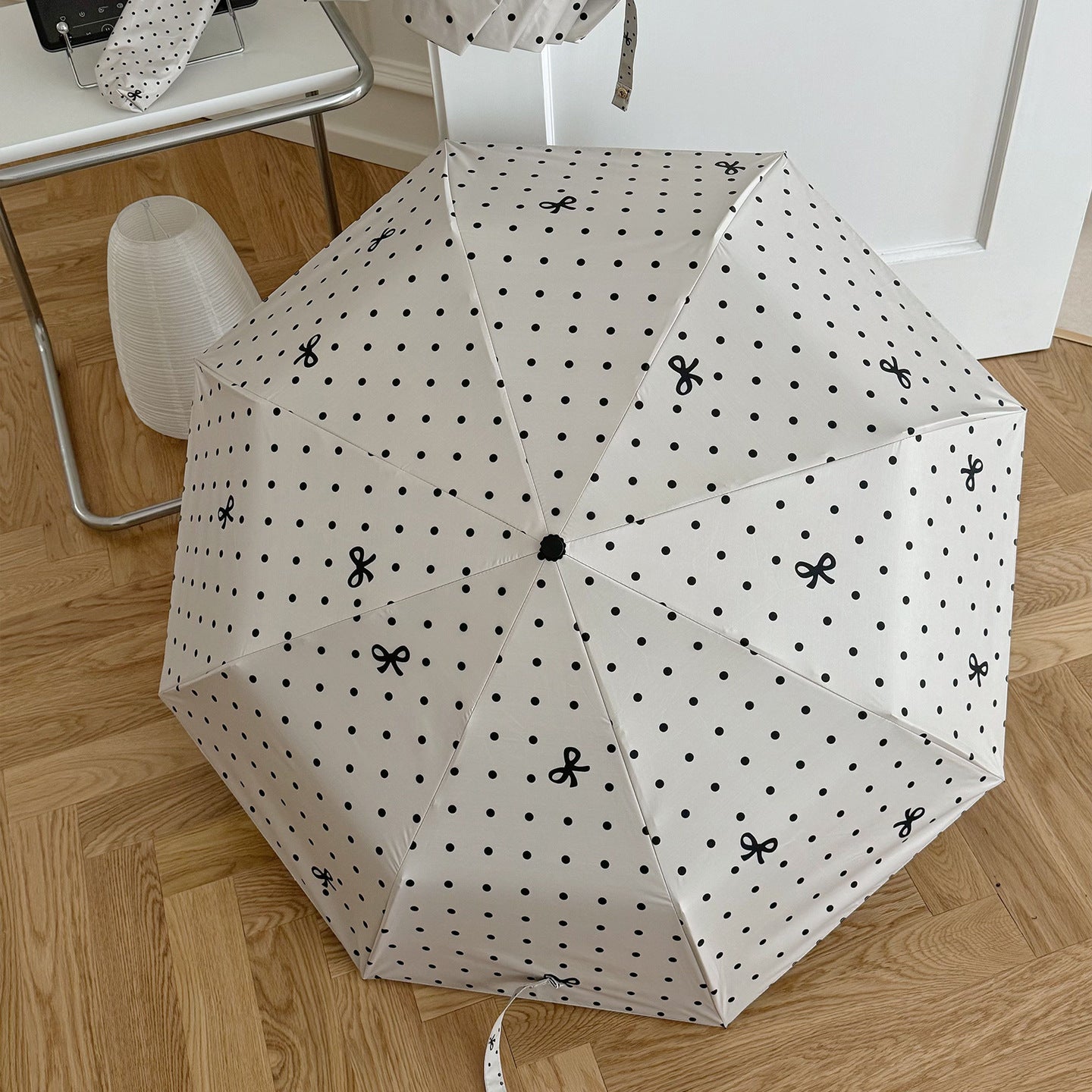 Damen kompakter Regenschirm mit stilvollem Punktedesign Brehn