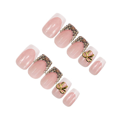 Kunstnagelset mit eleganten Goldverzierungen Brehn