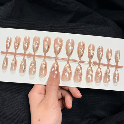 Elegante Stiletto Press-On Nagelkunstset mit Blumenakzenten Brehn