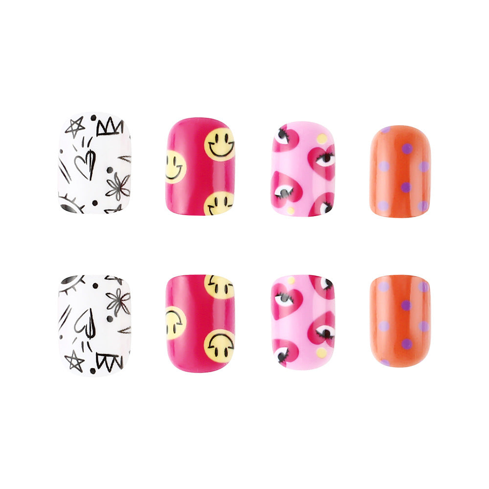 Künstlerisches Press-On Nagelkunst Set mit verspielten Designs Brehn