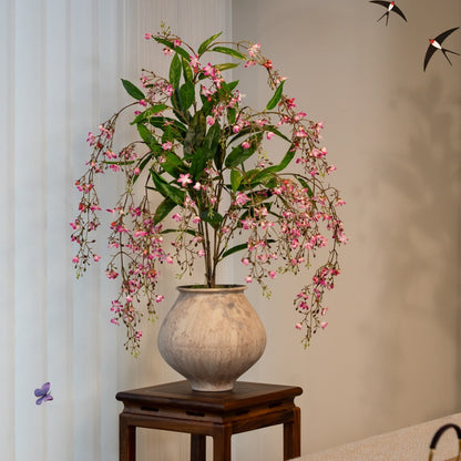 Lebensechte Orchideenblütenarrangement