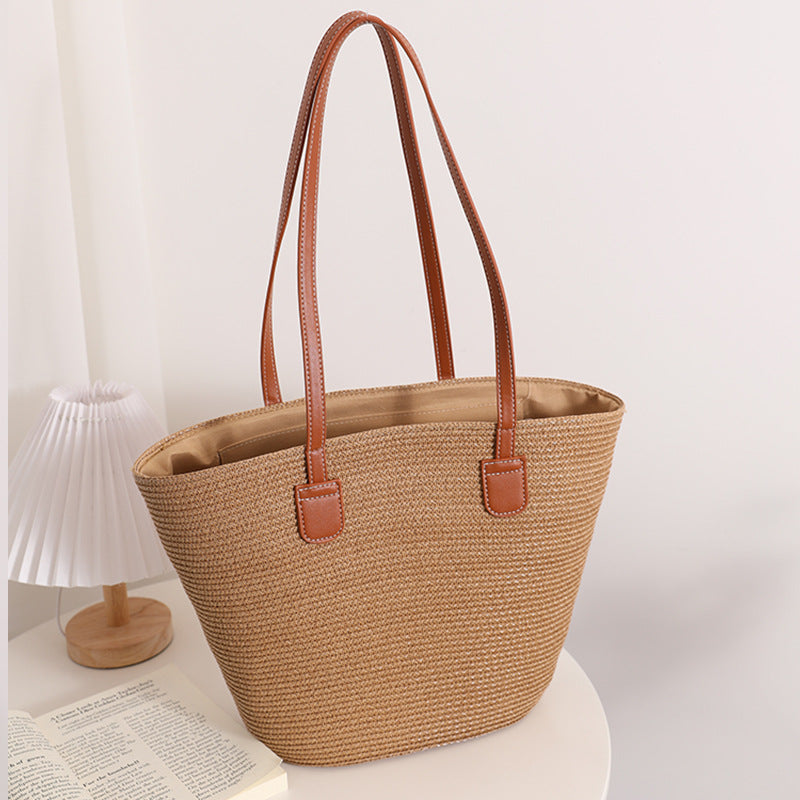Elegante Bast-Handtasche mit Ledergriffen Brehn