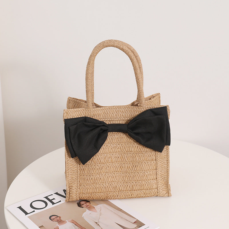 Elegante Basttasche mit Schleifendetail Brehn
