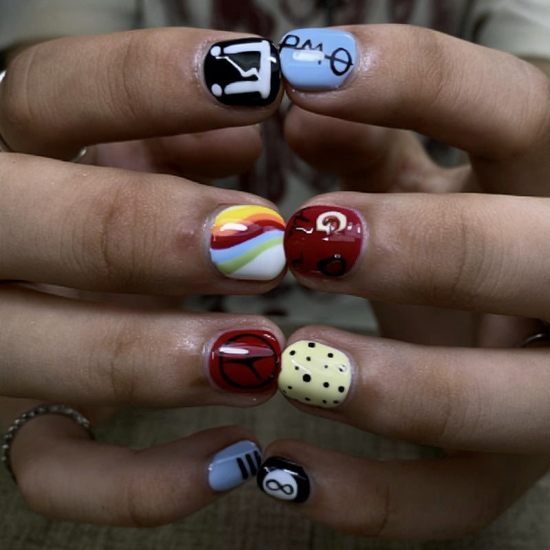 Kunstnagelset mit kreativen und bunten Designs Brehn