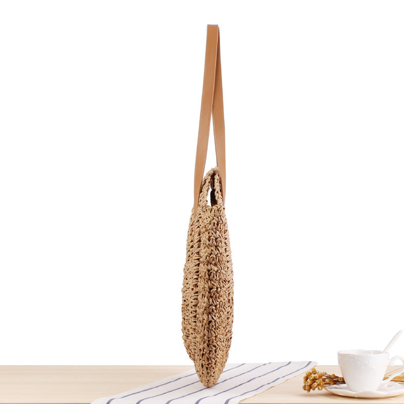 Runde Strohtasche mit Ledergriffen Brehn