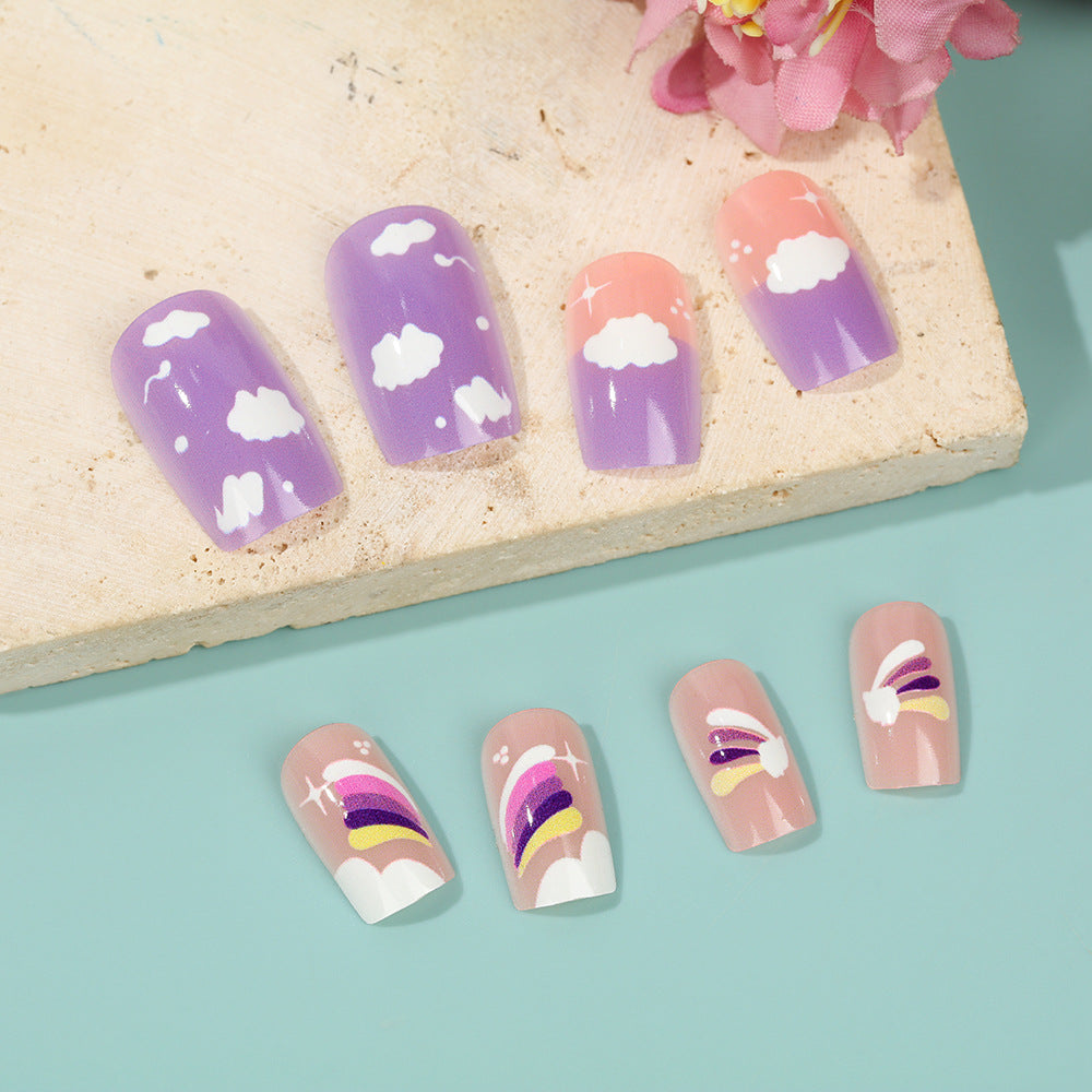 Kreatives Nail Art Set mit bunten Regenbogen- und Wolkenmotiven Brehn