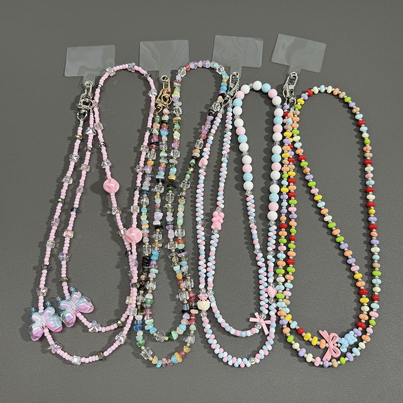 Perlenbrille Kette mit Schmetterlingsakzenten Brehn