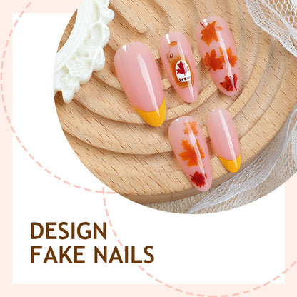 Kunstnagelset mit Herbstblatt-Dekoren und eleganten Farbverläufen Brehn