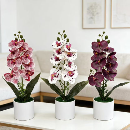 Dekorative künstliche Orchideenarrangement für Tischdeko
