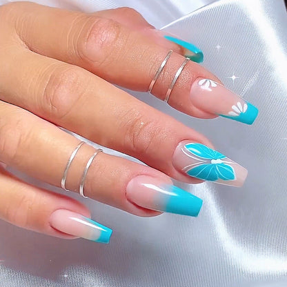 Kunstvolle Nagelkunst mit Ombre- und Blumenverzierungen Brehn