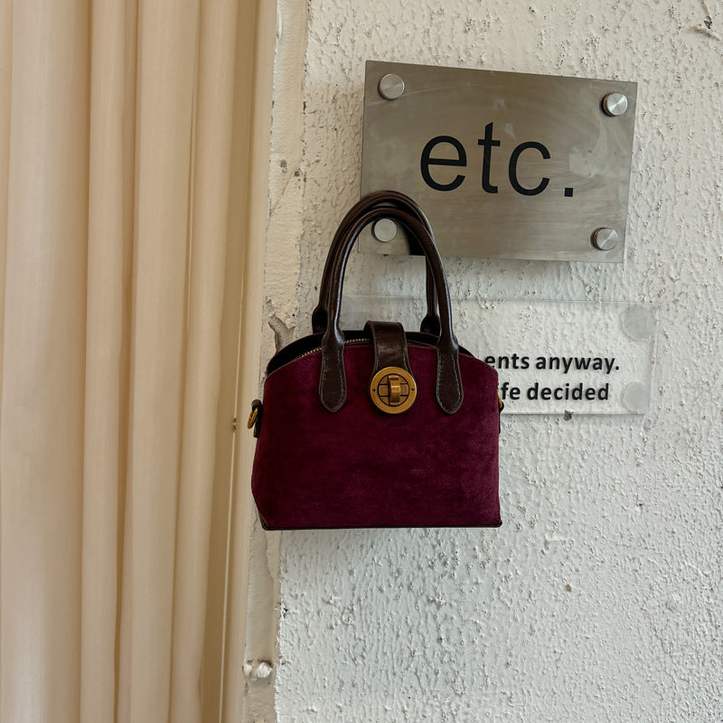 Handtasche aus Wildleder