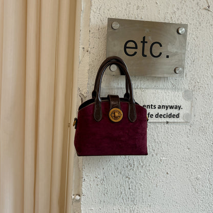 Handtasche aus Wildleder
