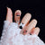 Kunstnagelset mit eleganter Schleifen- und Blumendekoration Brehn