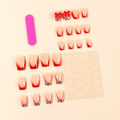 Dekorative Acryl-Nagelkunstverlängerungen mit Schleifenakzenten Brehn