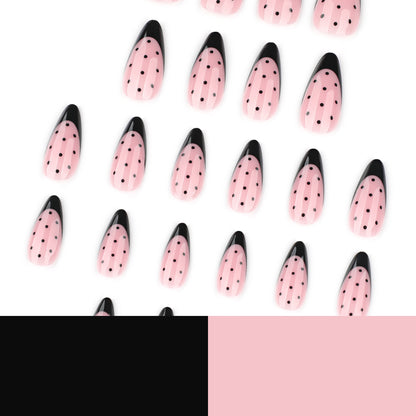 Kunstvolle Stiletto-Nägel mit Schwarz-Punkt-Muster Brehn